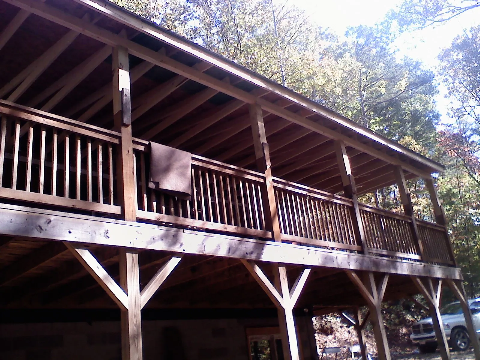 Timber framing under a new elevated porch and deck — Roof Leak Repair in Oakland Mills by Roofing Brothers